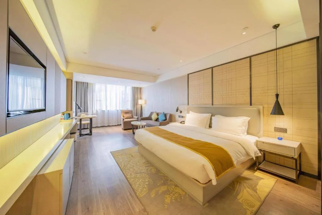 Bed in Echarm Hotel Changsha Guihua Park Metro Station