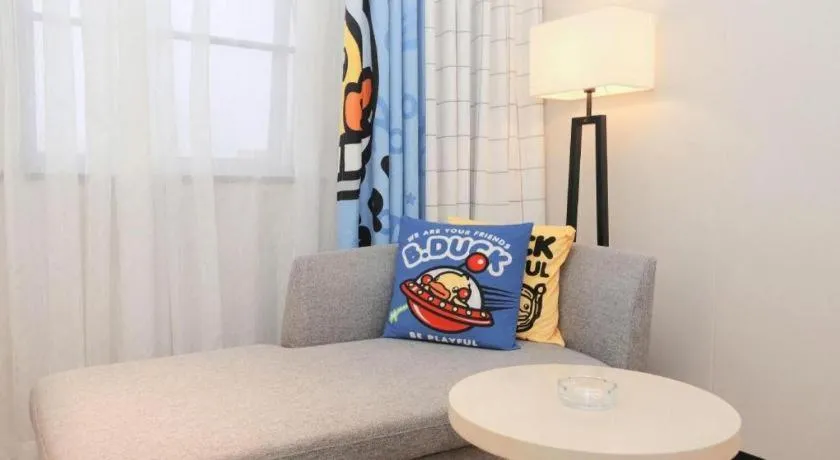 Bed in Echarm Hotel Changsha Guihua Park Metro Station