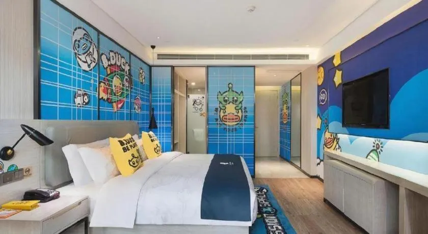 Bed in Echarm Hotel Changsha Guihua Park Metro Station