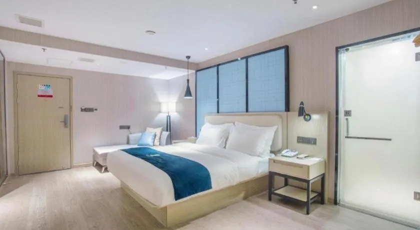 Bed in Echarm Hotel Xinyu Railway Station Baoshi Park