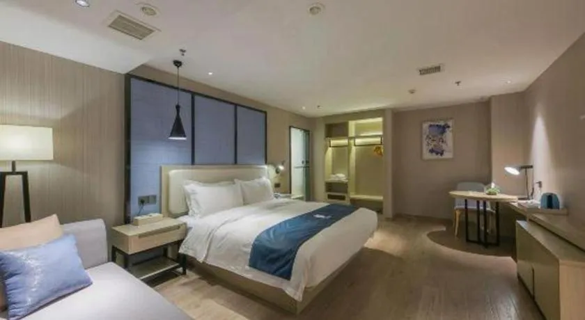 Bed in Echarm Hotel Xinyu Railway Station Baoshi Park