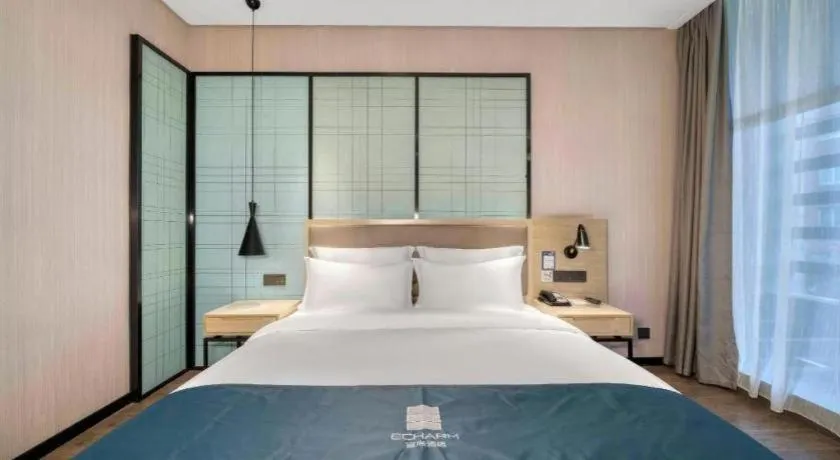 Bed in Echarm Hotel Nanjing Jiangning Tianyin Avenue Metro Station