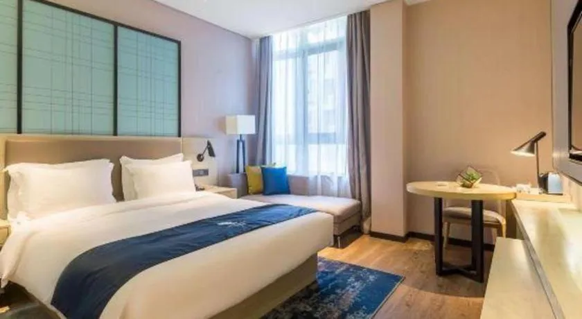 Bed in Echarm Hotel Nanjing Jiangning Tianyin Avenue Metro Station