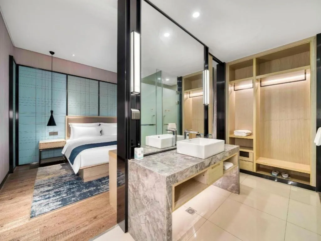 Bed in Echarm Hotel Nanjing Jiangning Tianyin Avenue Metro Station