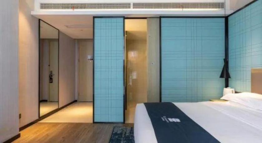 Bed in Echarm Hotel Nanjing Jiangning Tianyin Avenue Metro Station