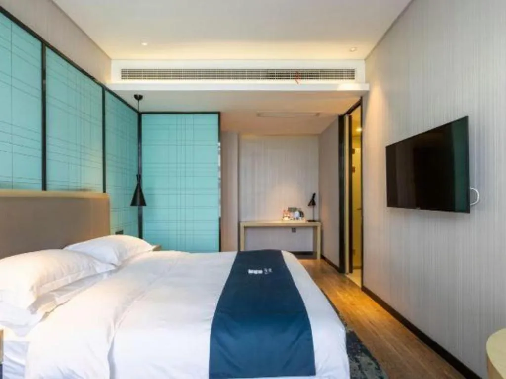 Bed in Echarm Hotel Nanjing Jiangning Tianyin Avenue Metro Station