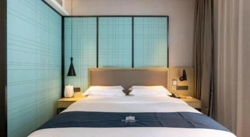 Bed in Echarm Hotel Nanjing Jiangning Tianyin Avenue Metro Station