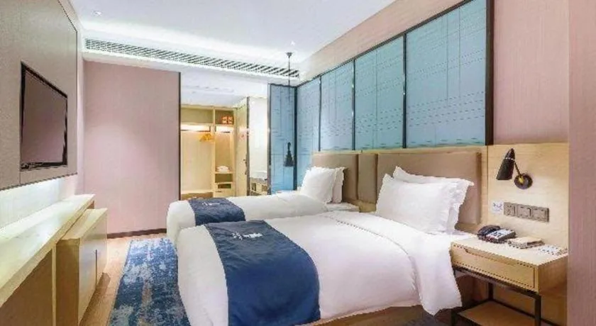 Bed in Echarm Hotel Nanjing Jiangning Tianyin Avenue Metro Station