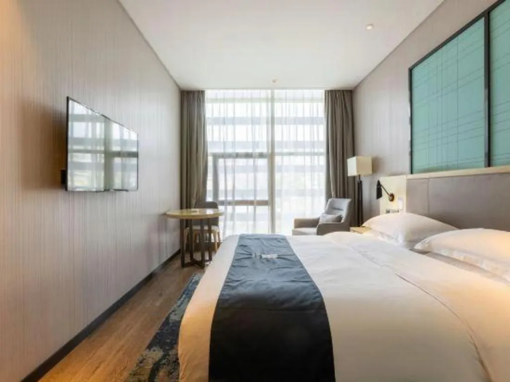 Bed in Echarm Hotel Nanjing Jiangning Tianyin Avenue Metro Station