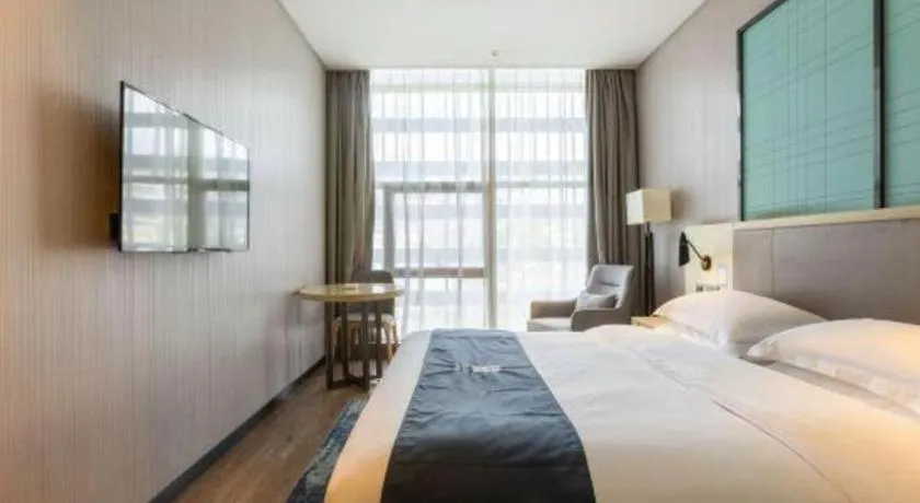 Bed in Echarm Hotel Nanjing Jiangning Tianyin Avenue Metro Station