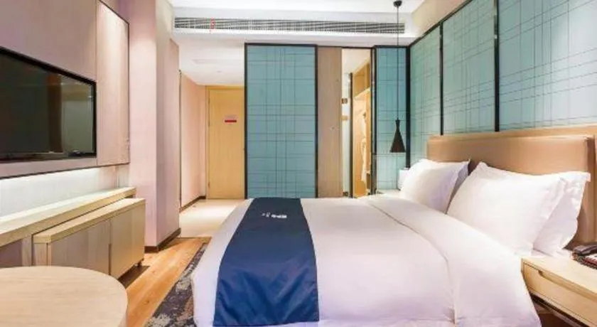 Bed in Echarm Hotel Nanjing Jiangning Tianyin Avenue Metro Station