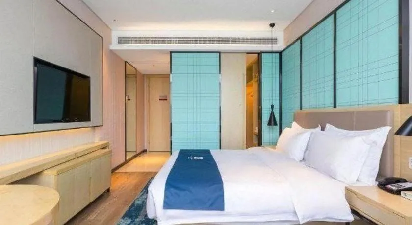 Bed in Echarm Hotel Nanjing Jiangning Tianyin Avenue Metro Station