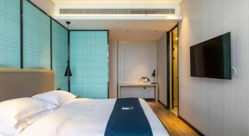 Bed in Echarm Hotel Nanjing Jiangning Tianyin Avenue Metro Station