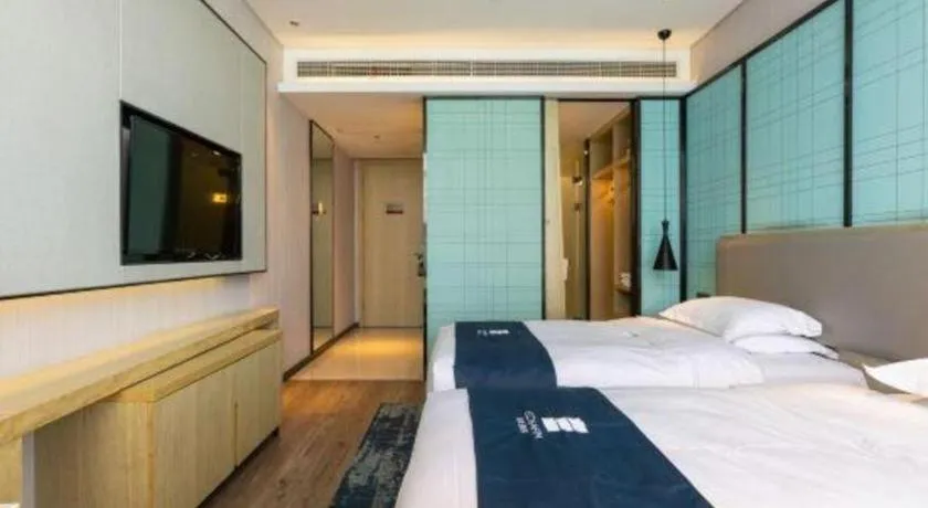 Bed in Echarm Hotel Nanjing Jiangning Tianyin Avenue Metro Station