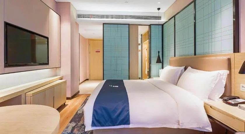 Bed in Echarm Hotel Nanjing Jiangning Tianyin Avenue Metro Station