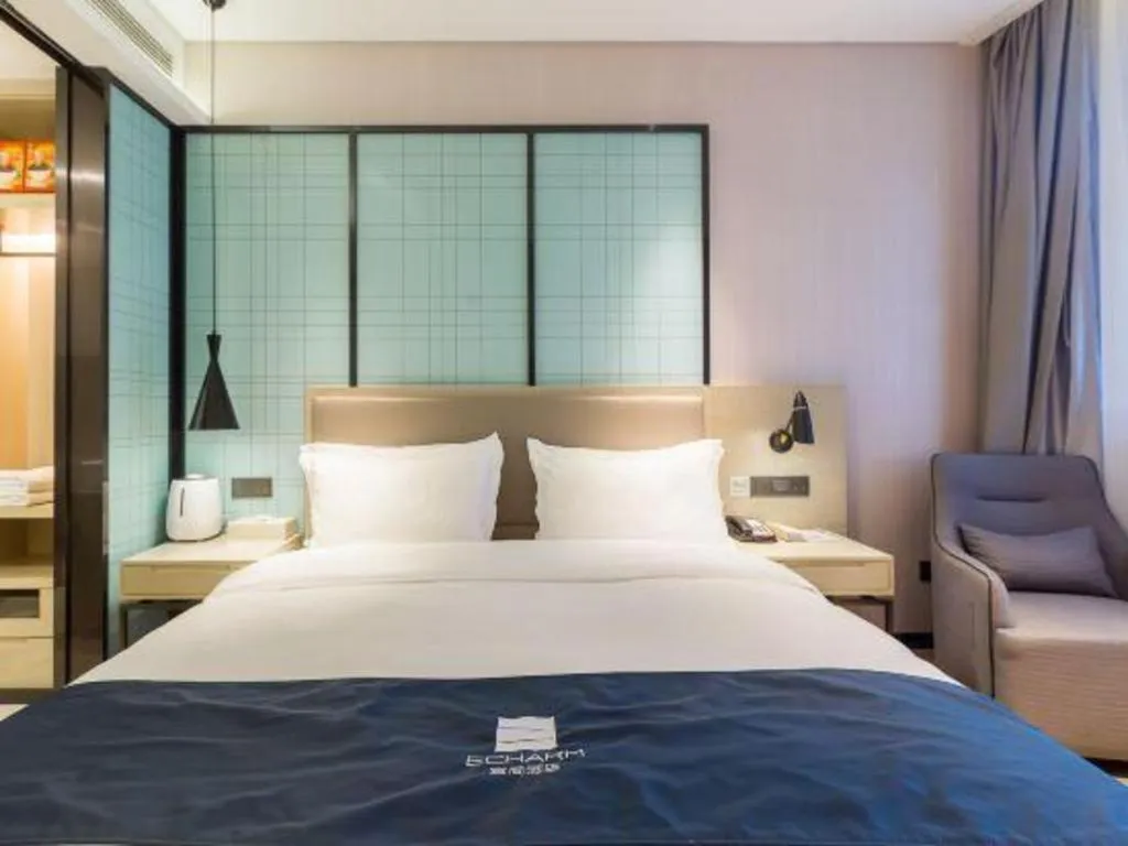 Bed in Echarm Hotel Nanjing Jiangning Tianyin Avenue Metro Station