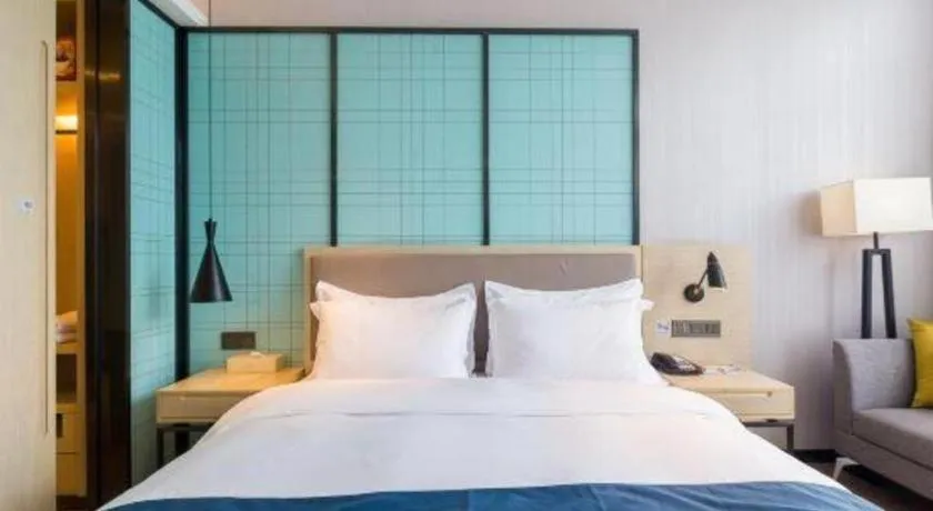 Bed in Echarm Hotel Nanjing Jiangning Tianyin Avenue Metro Station