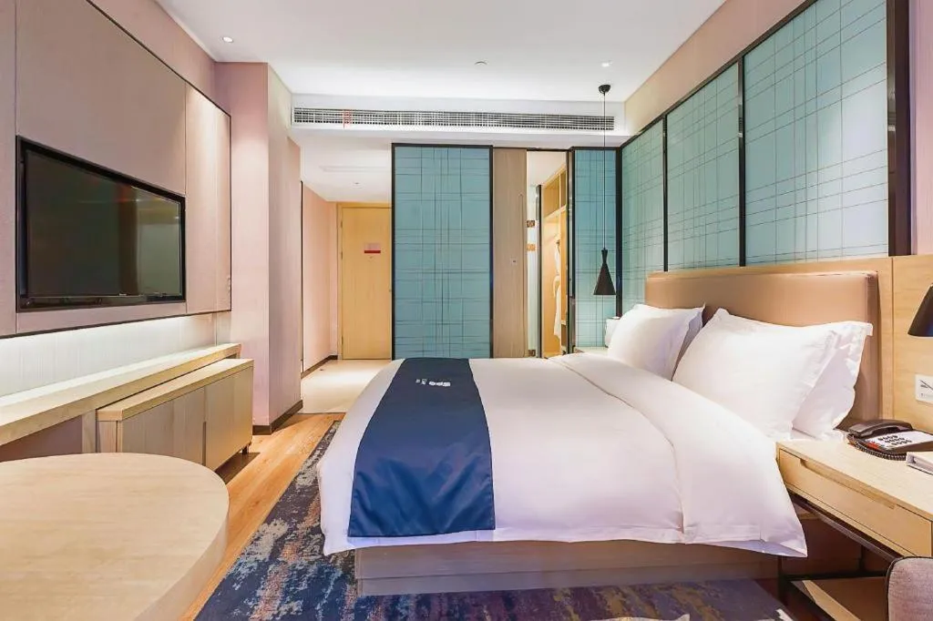 Bed in Echarm Hotel Nanjing Jiangning Tianyin Avenue Metro Station
