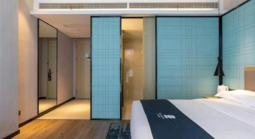 Bed in Echarm Hotel Nanjing Jiangning Tianyin Avenue Metro Station