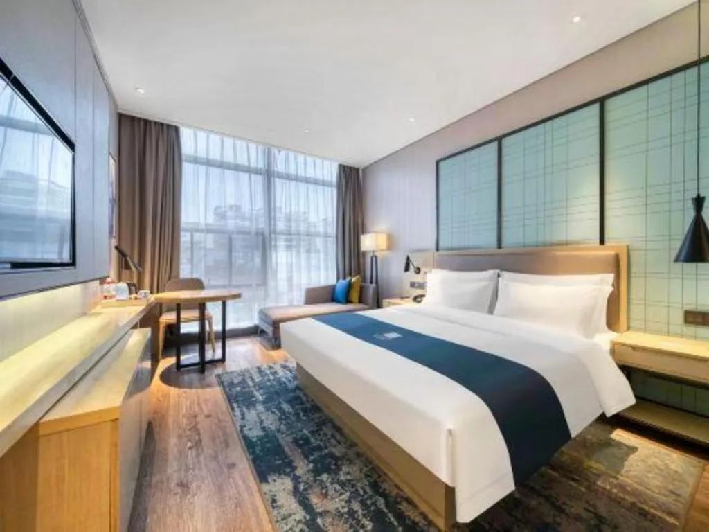 Bed in Echarm Hotel Nanjing Jiangning Tianyin Avenue Metro Station