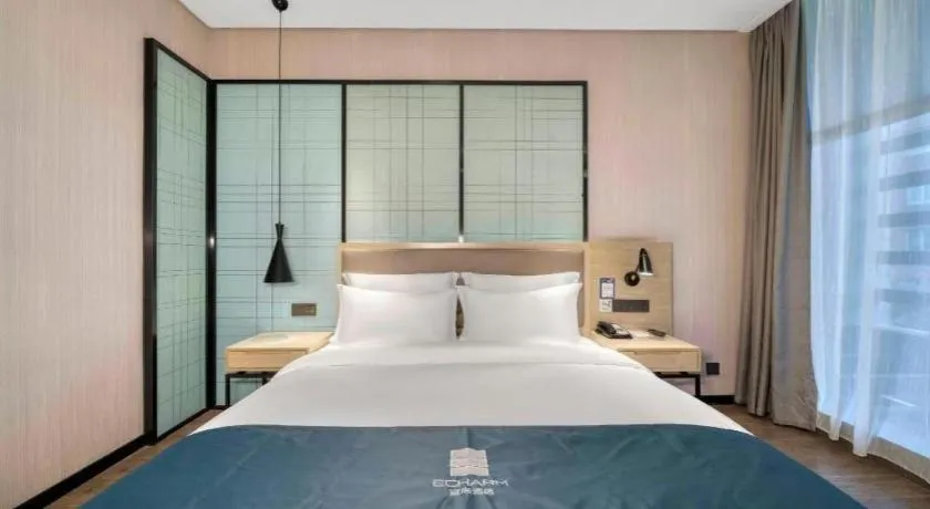 Bed in Echarm Hotel Nanjing Jiangning Tianyin Avenue Metro Station