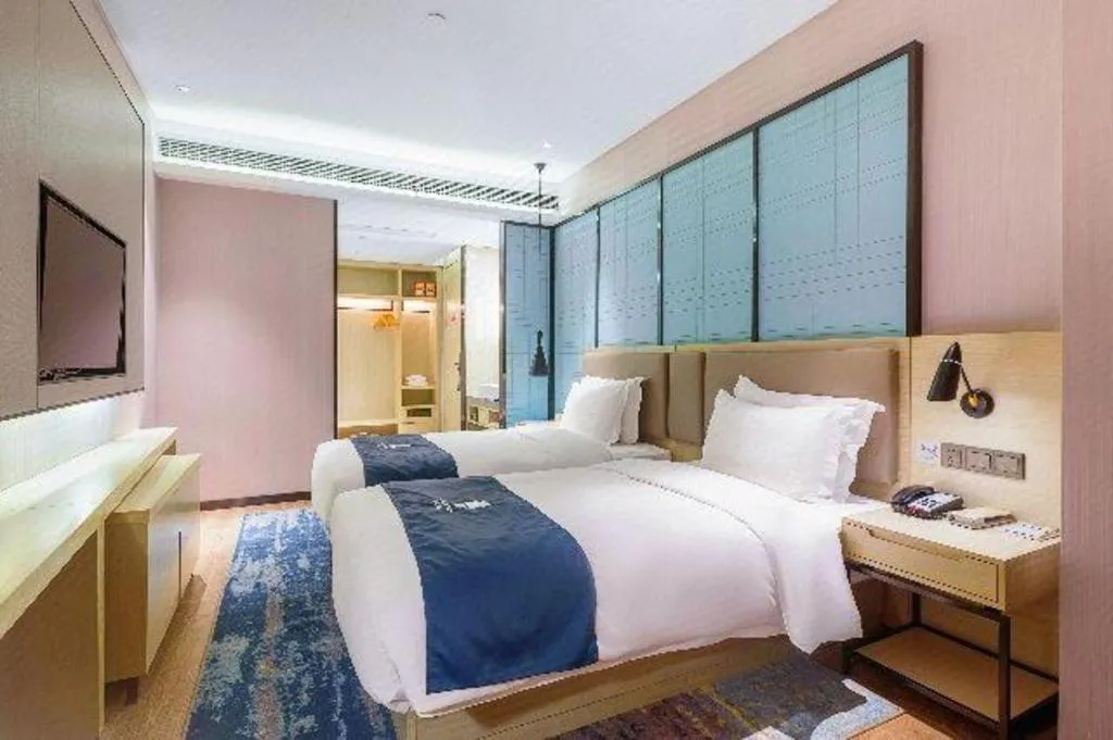 Bed in Echarm Hotel Nanjing Jiangning Tianyin Avenue Metro Station