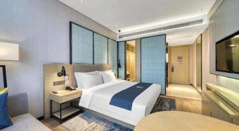 Bed in Echarm Hotel Nanjing Jiangning Tianyin Avenue Metro Station