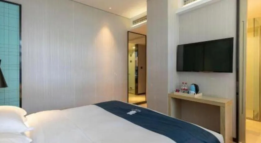 Bed in Echarm Hotel Nanjing Jiangning Tianyin Avenue Metro Station