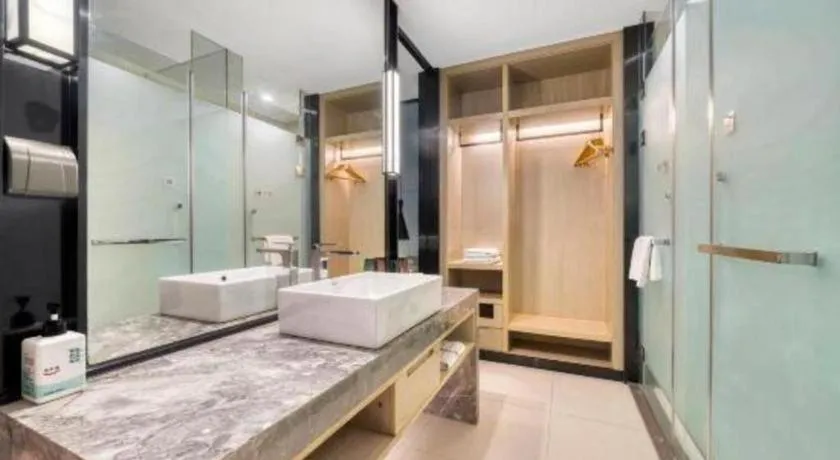 Bed in Echarm Hotel Nanjing Jiangning Tianyin Avenue Metro Station