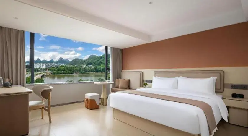 Bed in Immersing Hotel Guilin Two Rivers and Four Lakes Dongxi Alley Bed in Immersing Hotel Guilin Two Rivers and Four Lakes Dongxi Alley