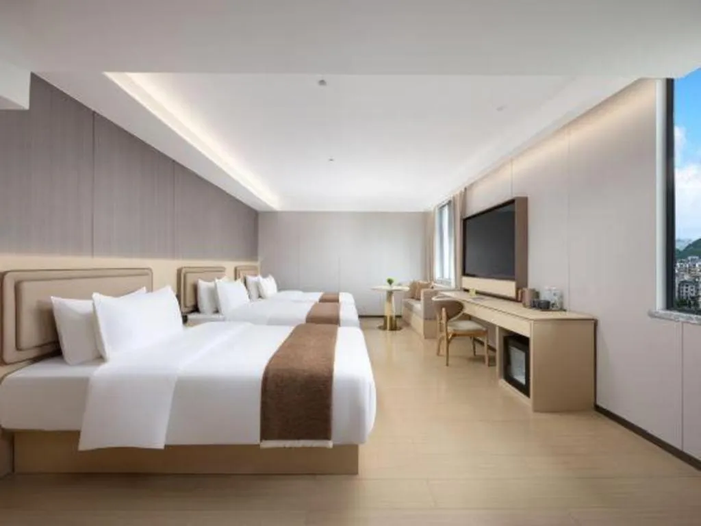 Bed in Immersing Hotel Guilin Two Rivers and Four Lakes Dongxi Alley