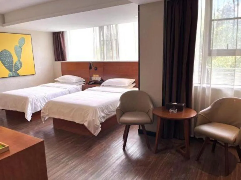 Bed in Immersing Hotel Guilin Two Rivers and Four Lakes Dongxi Alley