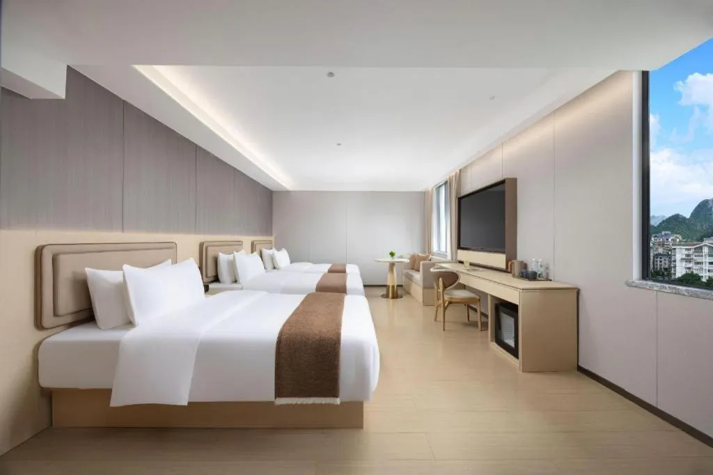 Bed in Immersing Hotel Guilin Two Rivers and Four Lakes Dongxi Alley