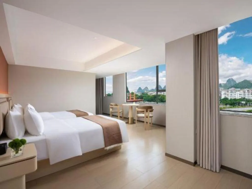 Bed in Immersing Hotel Guilin Two Rivers and Four Lakes Dongxi Alley