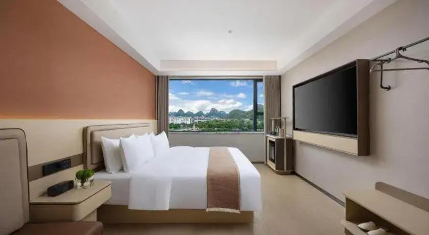 Bed in Immersing Hotel Guilin Two Rivers and Four Lakes Dongxi Alley Bed in Immersing Hotel Guilin Two Rivers and Four Lakes Dongxi Alley