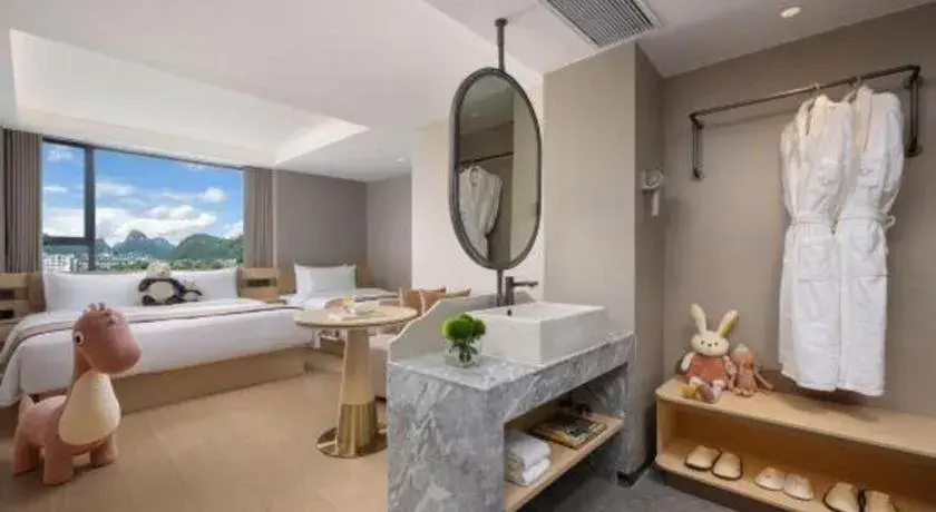 Bed in Immersing Hotel Guilin Two Rivers and Four Lakes Dongxi Alley Bed in Immersing Hotel Guilin Two Rivers and Four Lakes Dongxi Alley