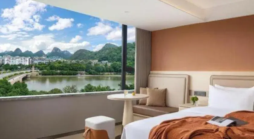 Bed in Immersing Hotel Guilin Two Rivers and Four Lakes Dongxi Alley Bed in Immersing Hotel Guilin Two Rivers and Four Lakes Dongxi Alley