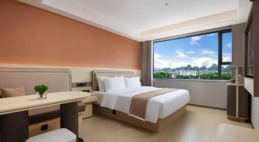 Bed in Immersing Hotel Guilin Two Rivers and Four Lakes Dongxi Alley Bed in Immersing Hotel Guilin Two Rivers and Four Lakes Dongxi Alley