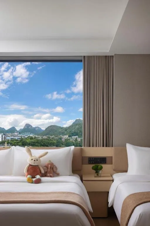 Bed in Immersing Hotel Guilin Two Rivers and Four Lakes Dongxi Alley