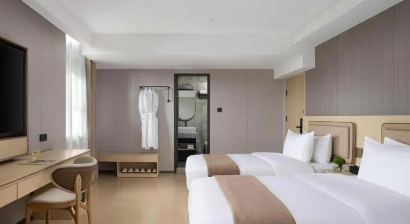 Bed in Immersing Hotel Guilin Two Rivers and Four Lakes Dongxi Alley