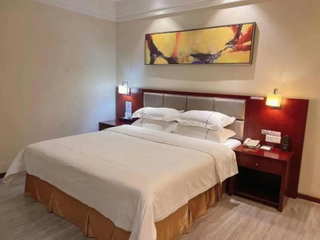 Bed in Borrman Hotel Guangzhou Changlong Shiqiao Metro Station