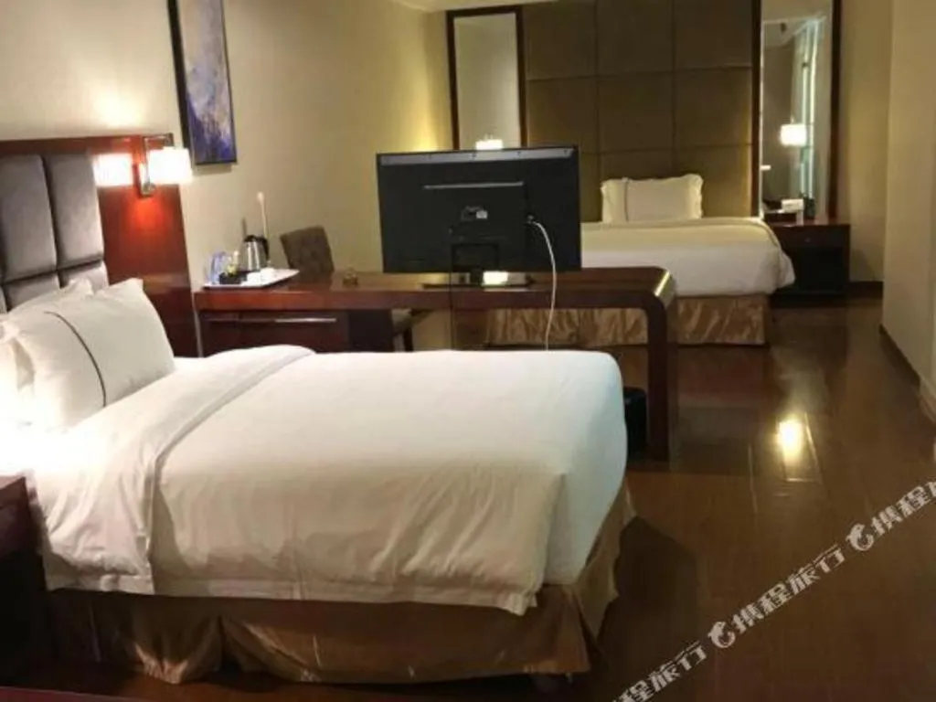 Bed in Borrman Hotel Guangzhou Changlong Shiqiao Metro Station