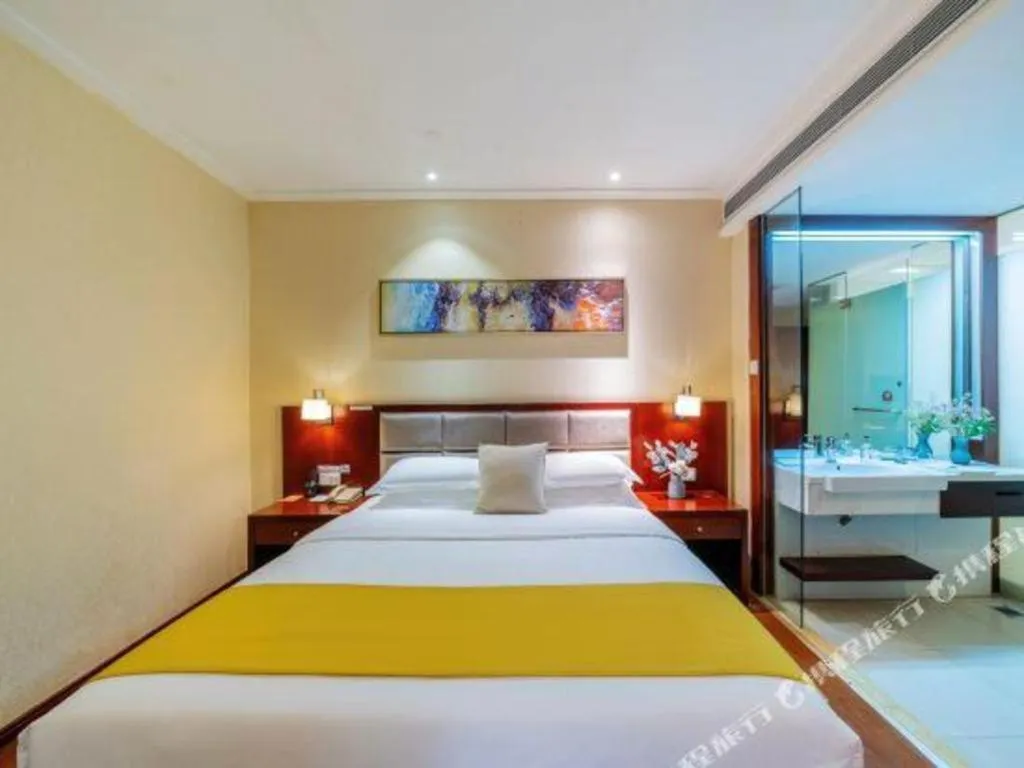 Bed in Borrman Hotel Guangzhou Changlong Shiqiao Metro Station
