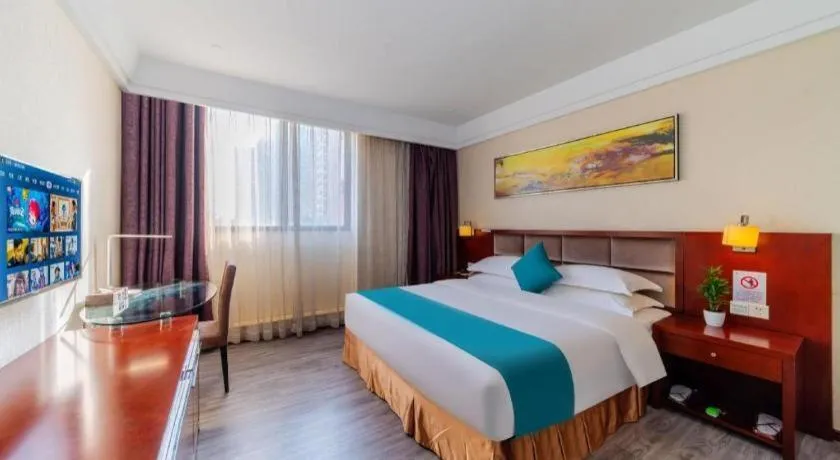 Bed in Borrman Hotel Guangzhou Changlong Shiqiao Metro Station