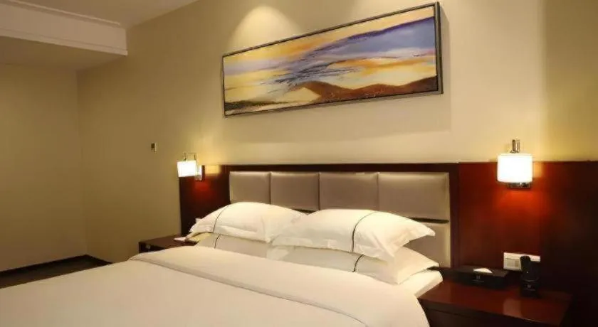 Bed in Borrman Hotel Guangzhou Changlong Shiqiao Metro Station