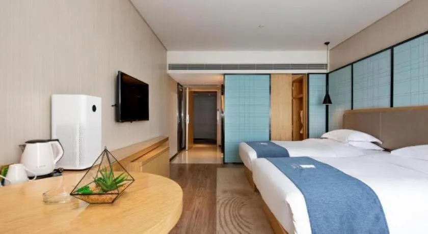 Bed in Echarm Hotel Changde Chaoyang D5 District