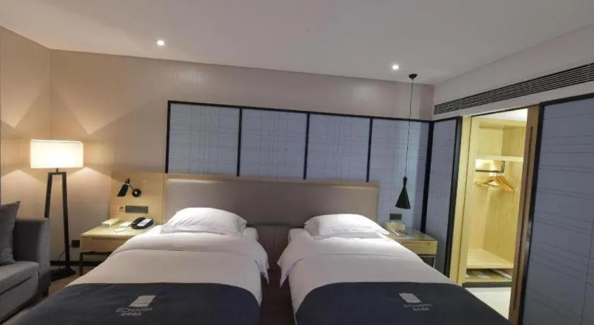 Bed in Echarm Hotel Changde Chaoyang D5 District