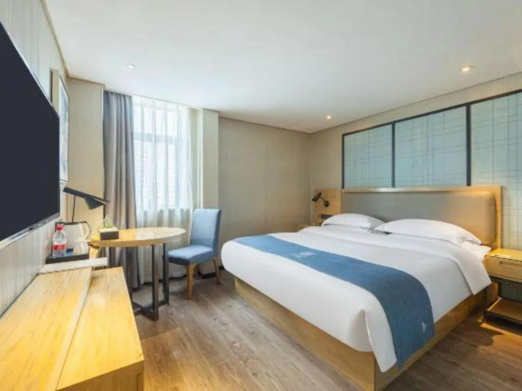 Bed in Echarm Hotel Changde Chaoyang D5 District