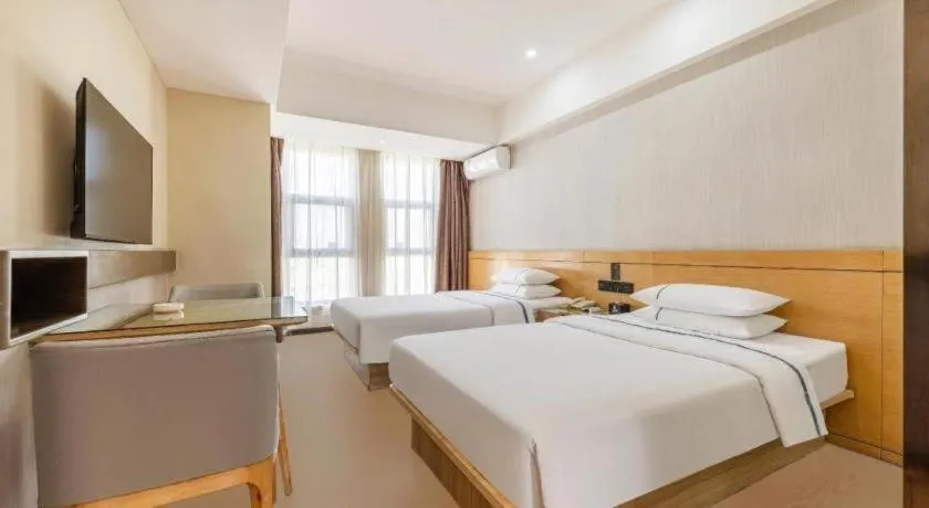 Bed in City Comfort Inn Yi'Ning Jichang Road Shanghaicheng