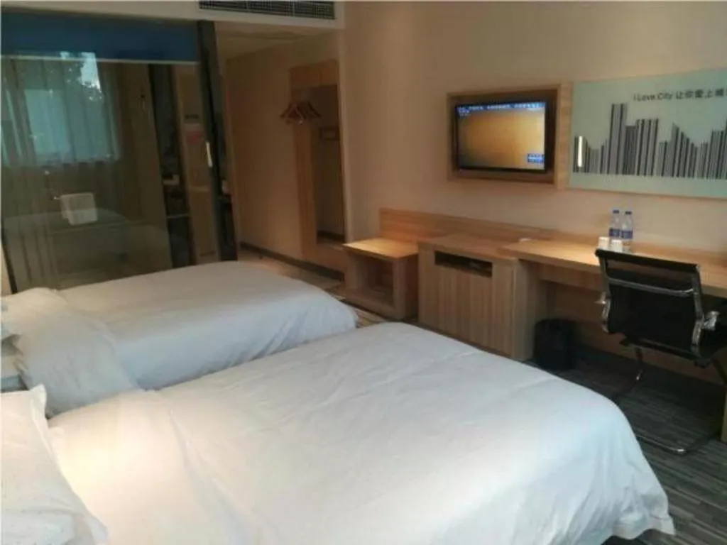 Bed in Jtour Inn Huanggang Hongan Lieshi Lingyuan